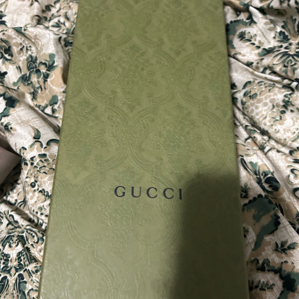 Gucci slides and they are like knew